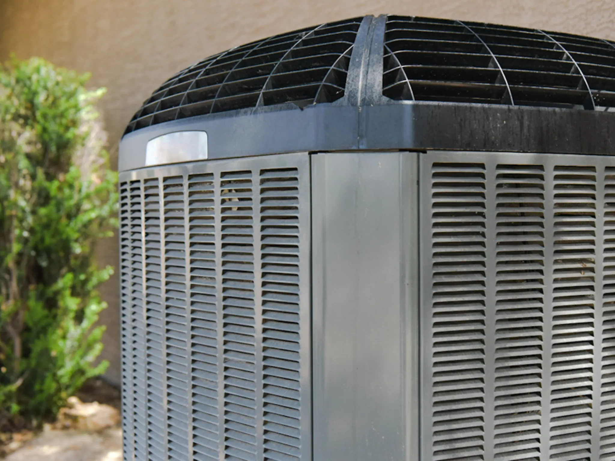 A close up photo of an AC unit