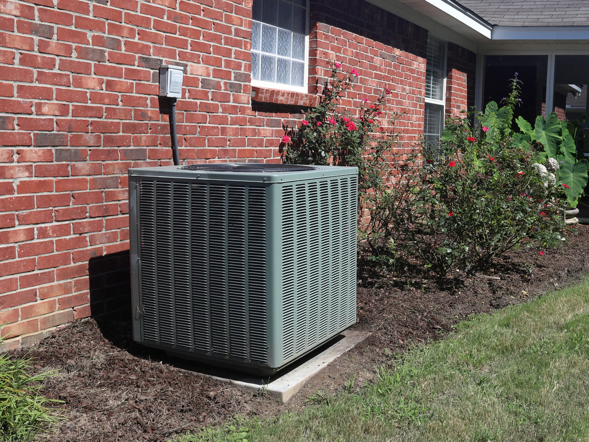 A photo of an AC unit outside of a customer's home