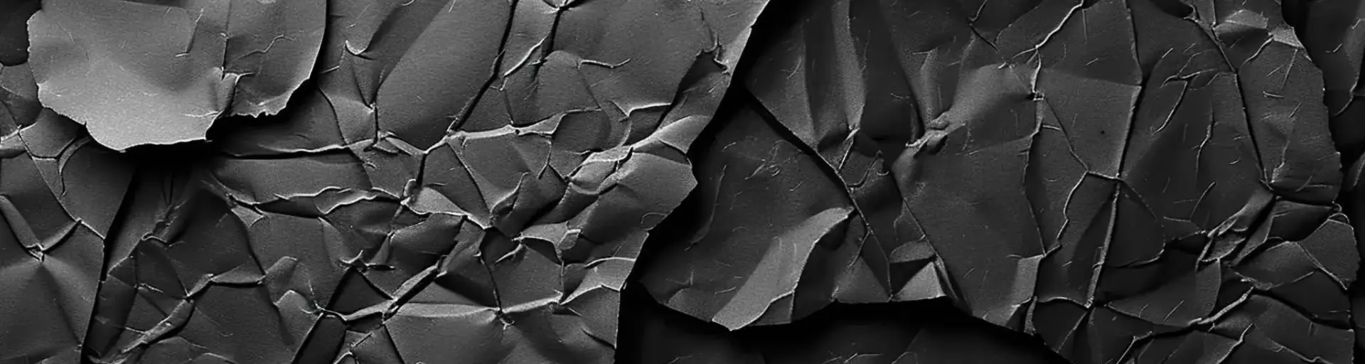 A photo of black paper gradient background